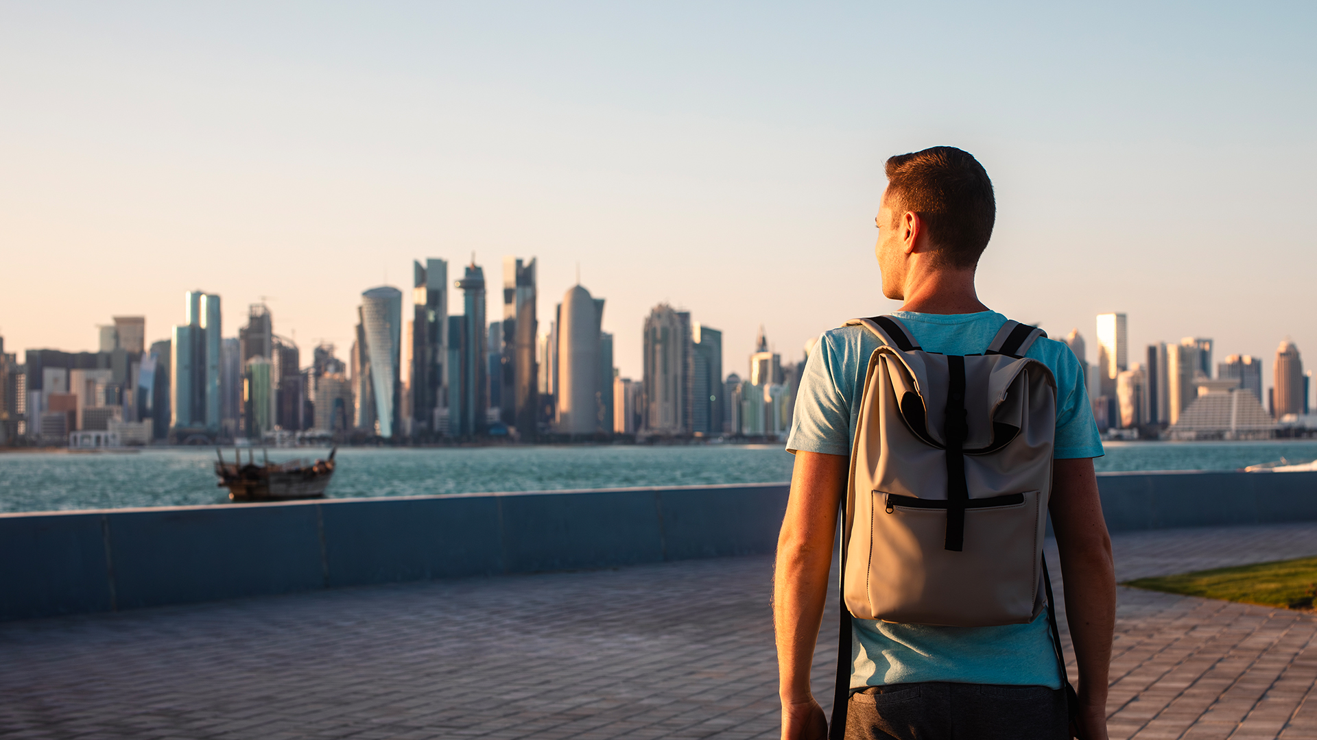 A man looking at westbay corniche Doha